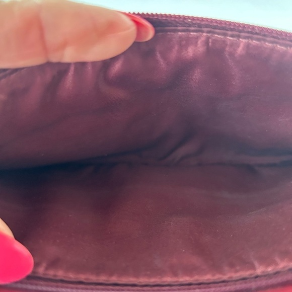 Coach NWOT Burgundy Leather Double Zippered Wristlet with Bow on Front